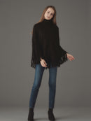 ケーブルニットポンチョ